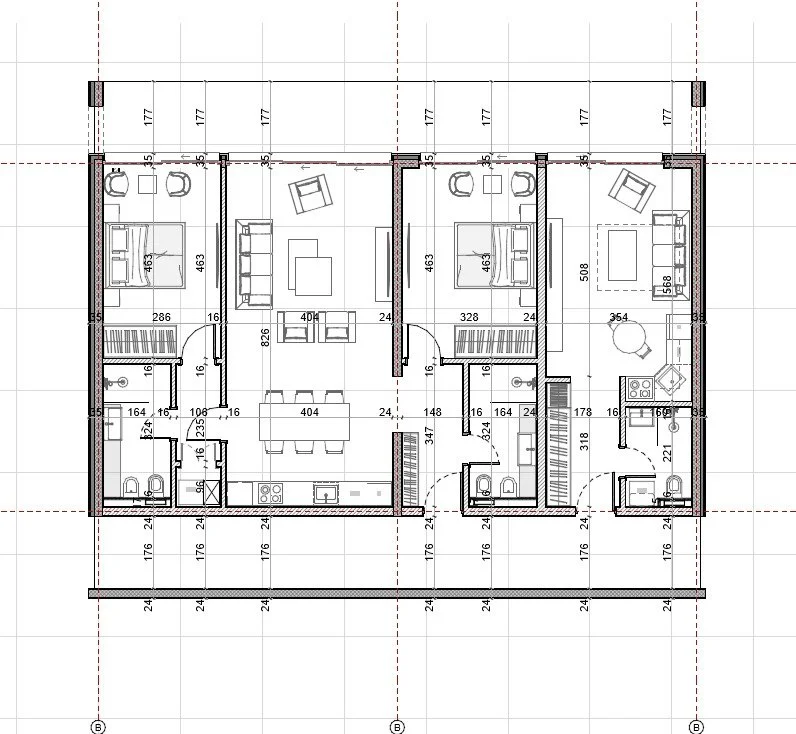 Floor plan of a multi-unit residential building with detailed layout of rooms, including bedrooms, bathrooms, living areas, kitchen, and furniture arrangements.