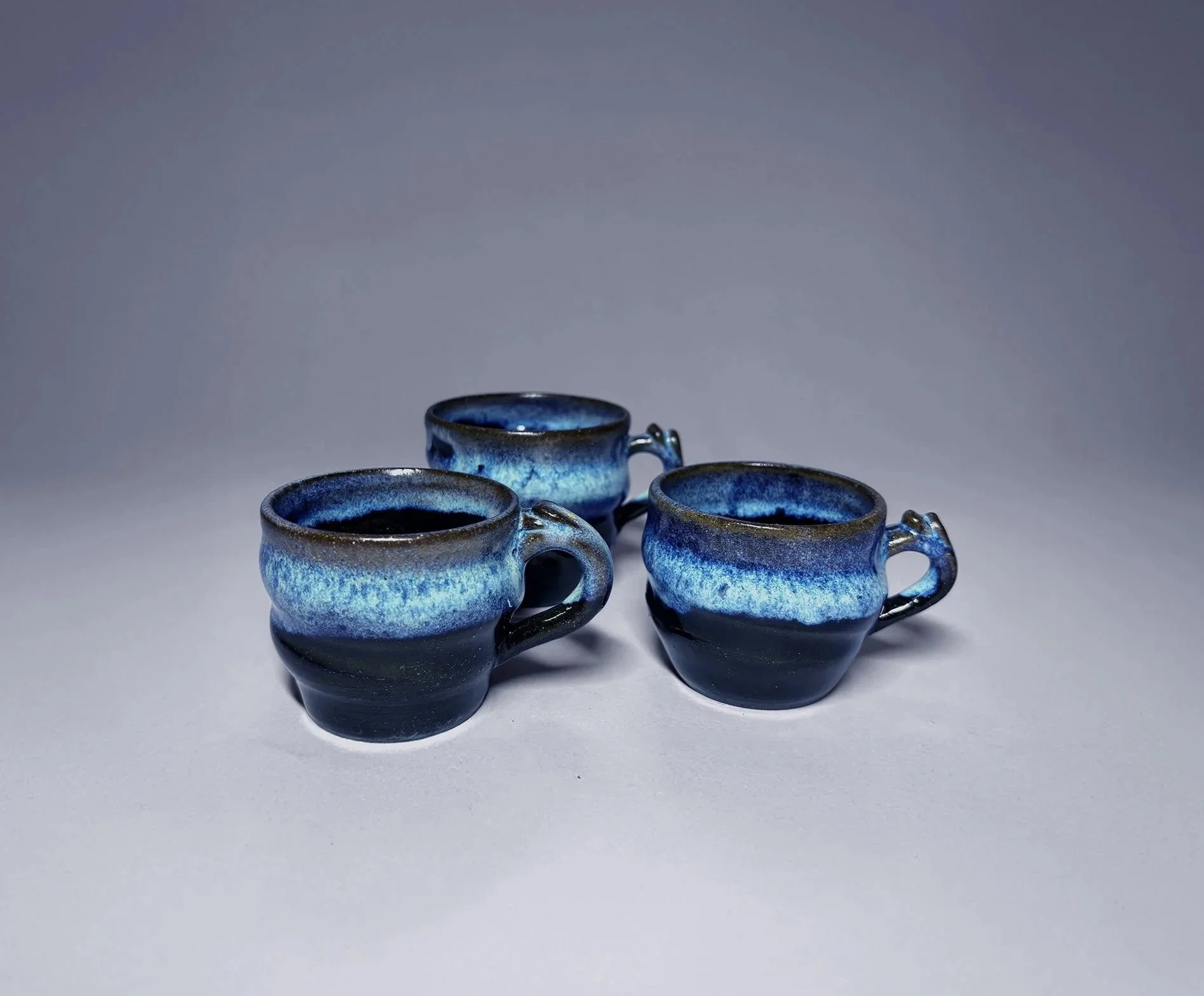 three_swirly_mugs.jpg