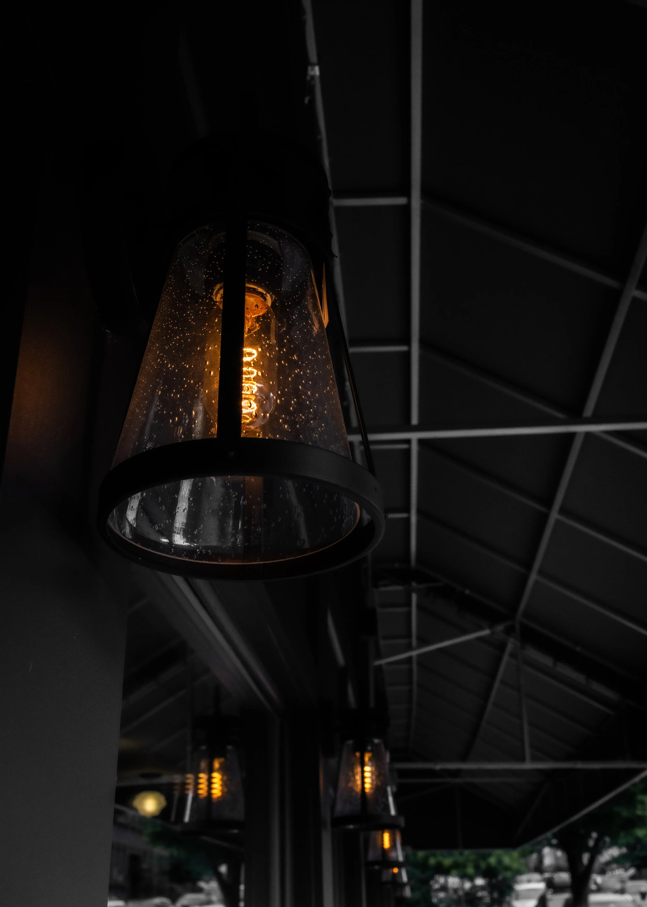 An exterior shot of the lights at the cocktail bar FOLK Brooklyn
