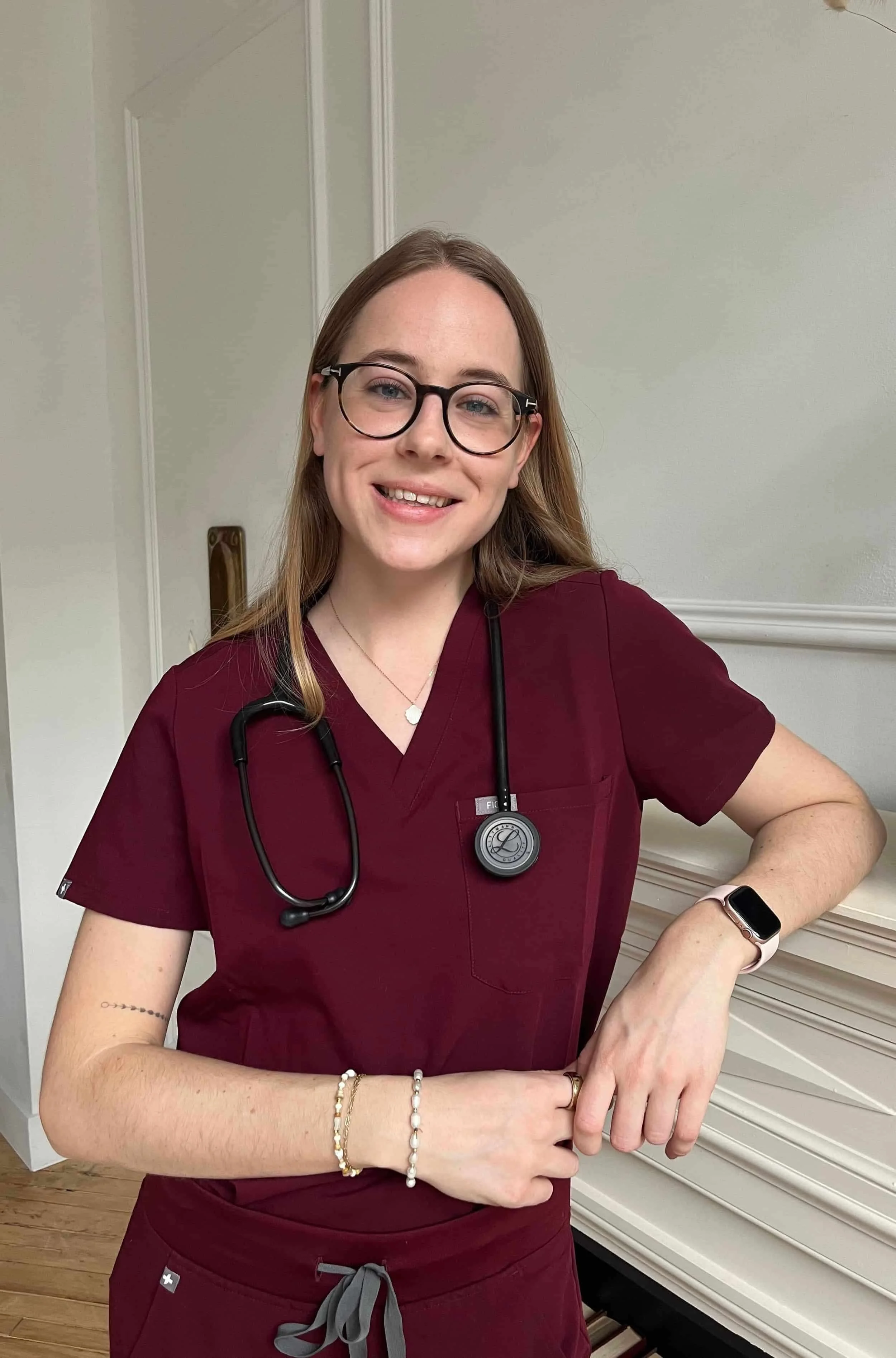 Megan Woroch in scrubs at the clinic