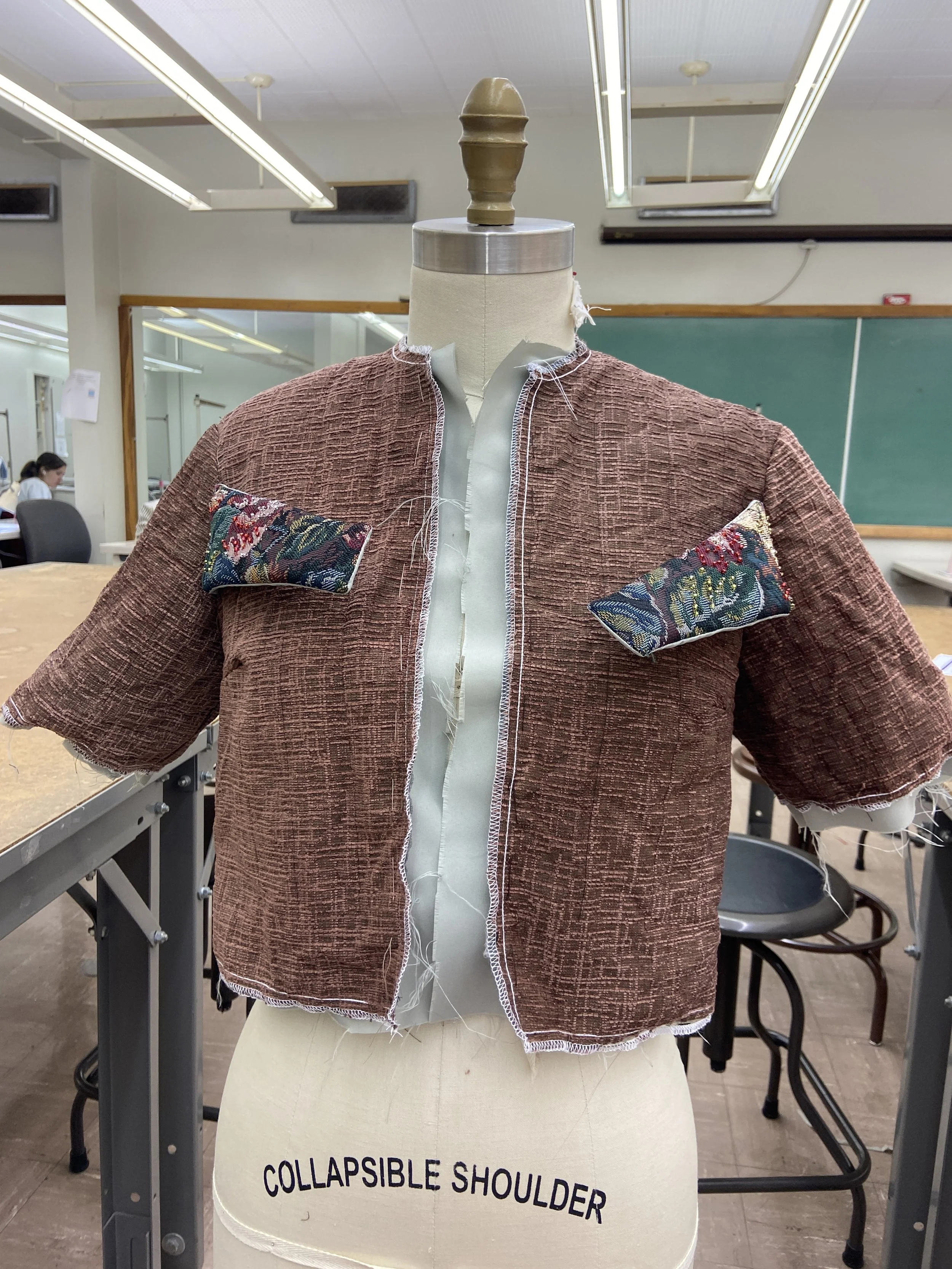 After quilting and attaching the sleeves and straps, I attached the lining to the jacket's outer shell fabric.
