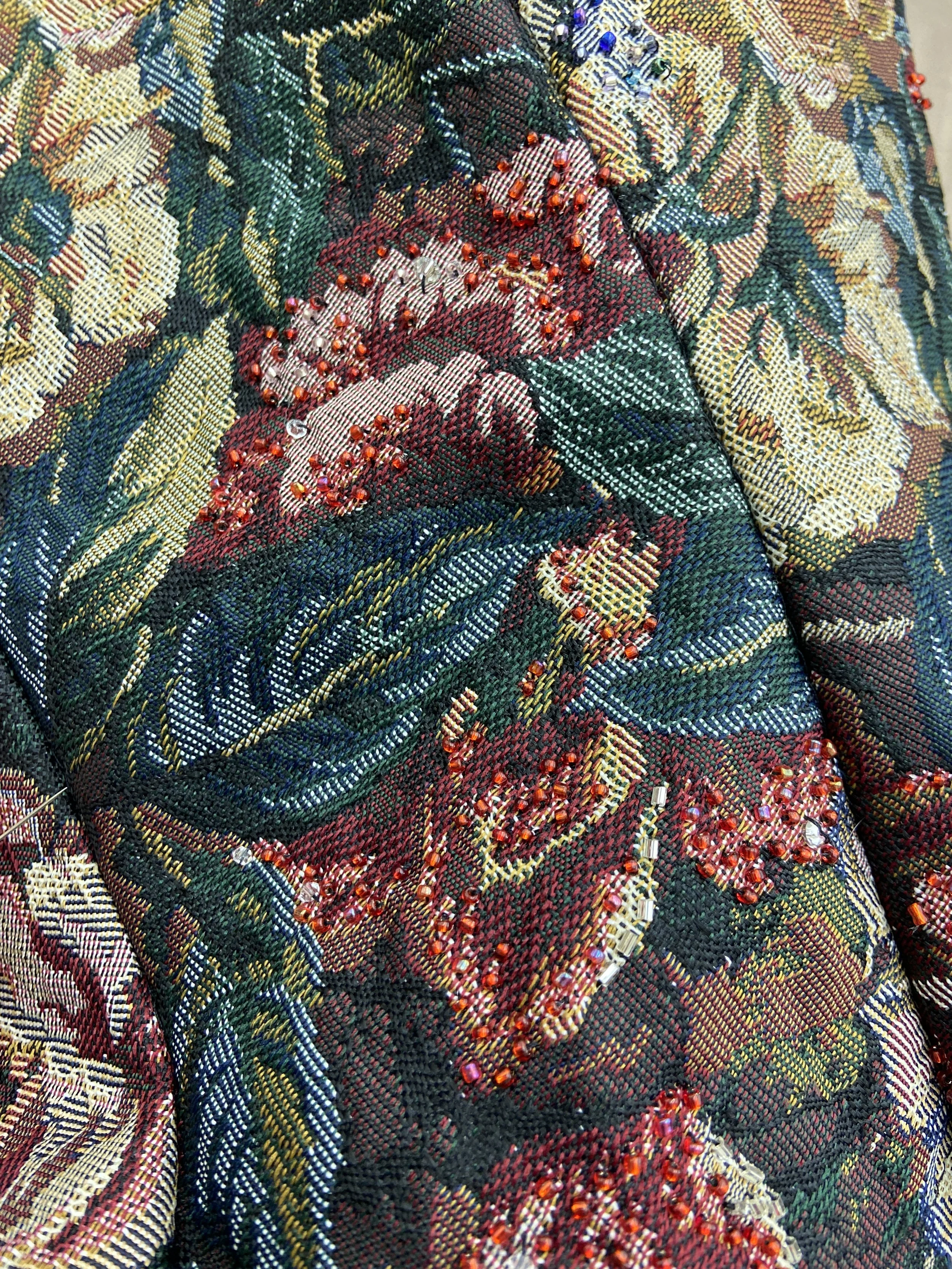 Detailed view of the beaded corset fabric