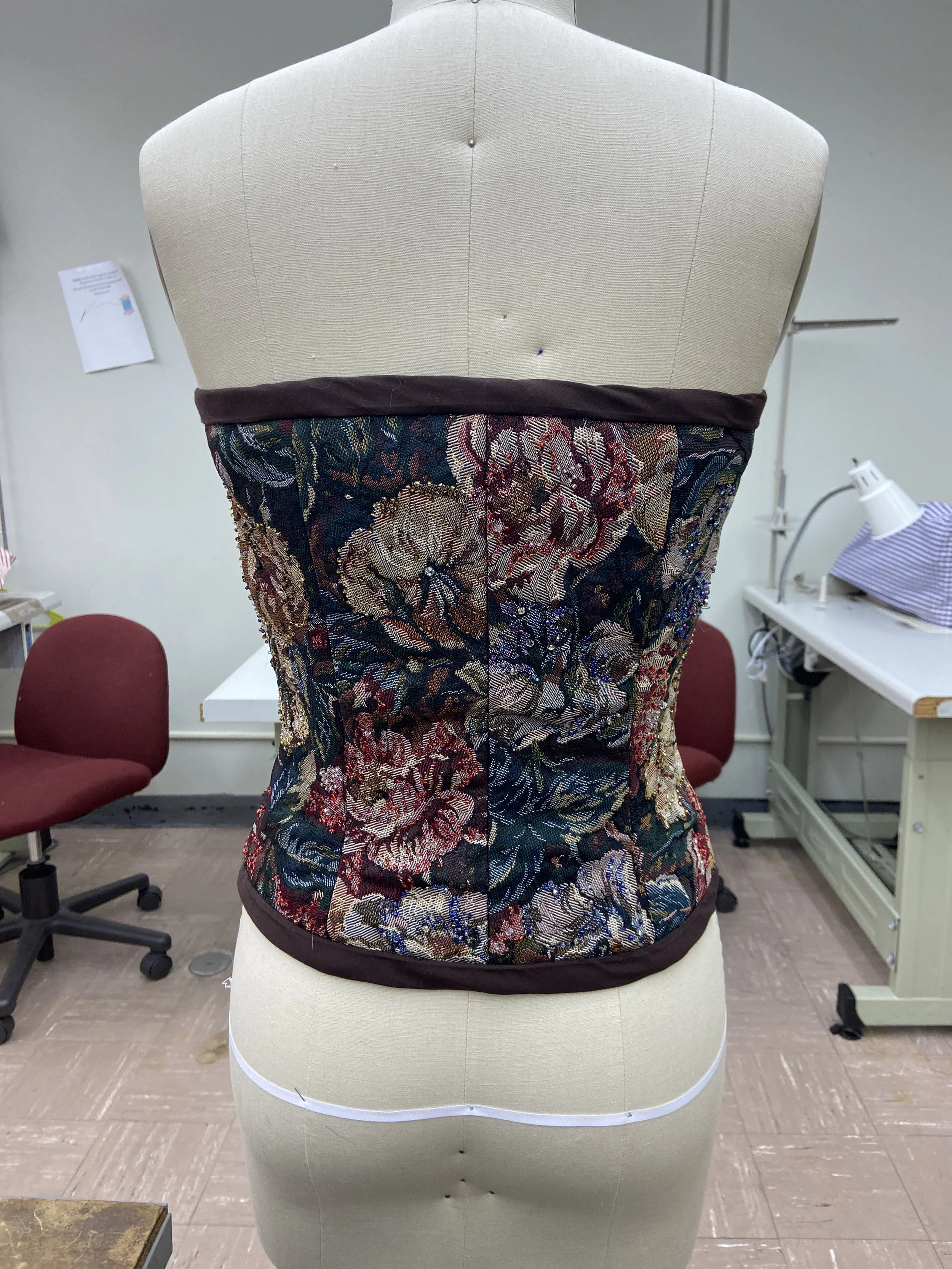 Back View: finished corset fitted to a mannequin