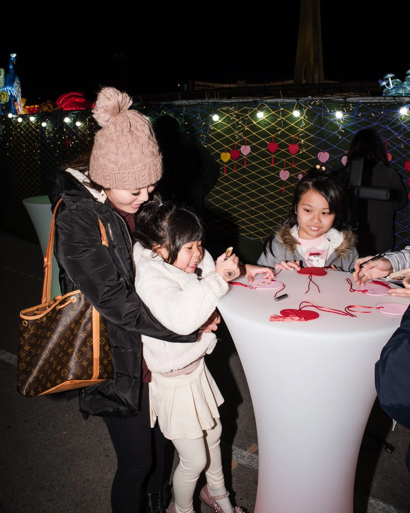 Step into the magic of GlowFest Las Vegas ✨ From the moment you arrive, you&rsquo;re welcomed with a complimentary wishing plaque. Write your hopes on a red card and hang them on the Wishing Wall for a little extra luck under the lantern lights. 🌟⁠

