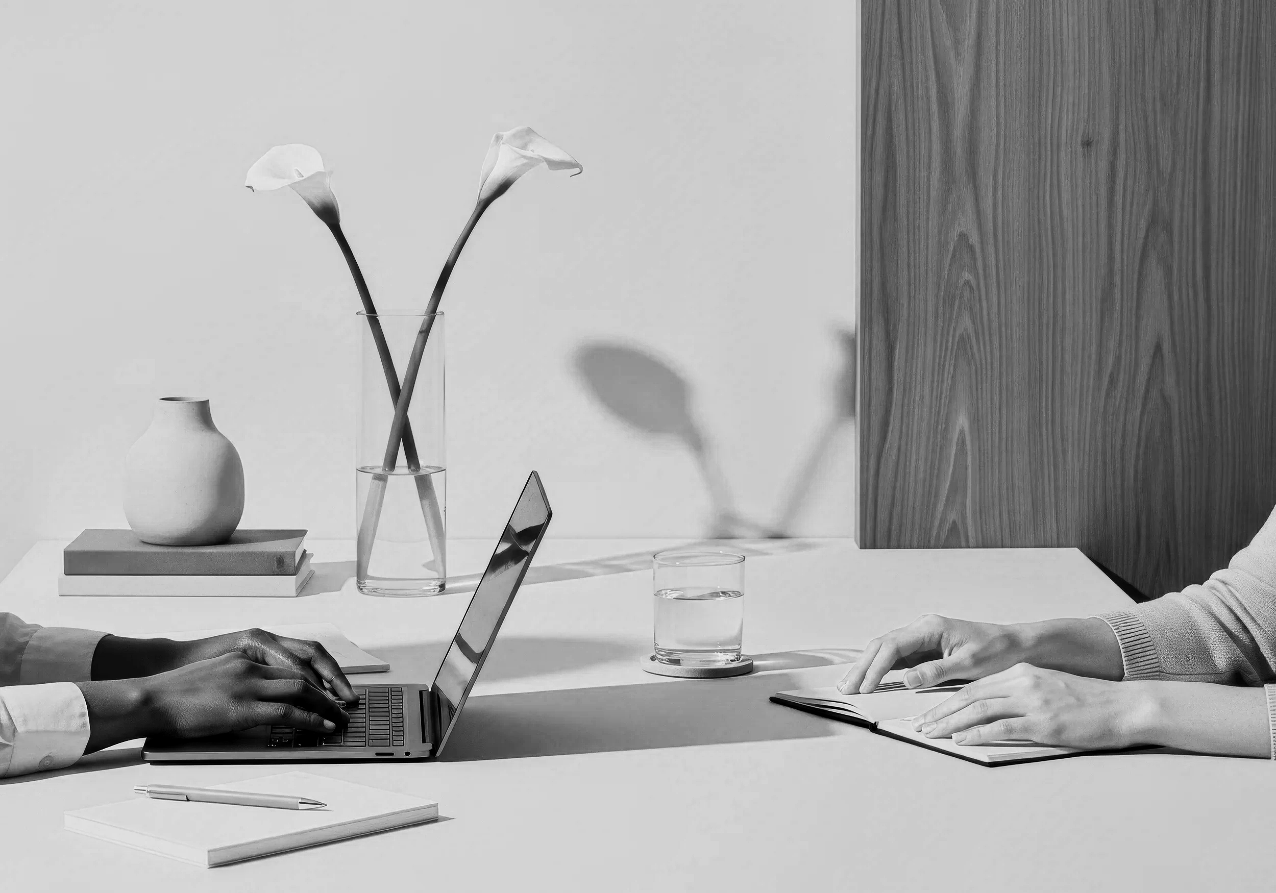 Content strategy planning session with laptop and notes representing authority-based content systems and brand development process