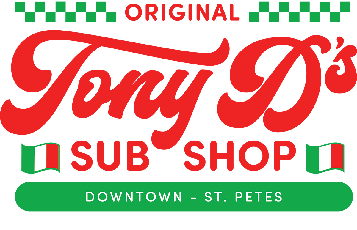 Sign for Tony D's Sub Shop in Downtown St. Pete, featuring red and green colors with checkered patterns and Italian flags.