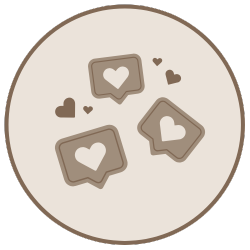 Four brown cookies with white hearts, surrounded by smaller hearts, on a beige background.