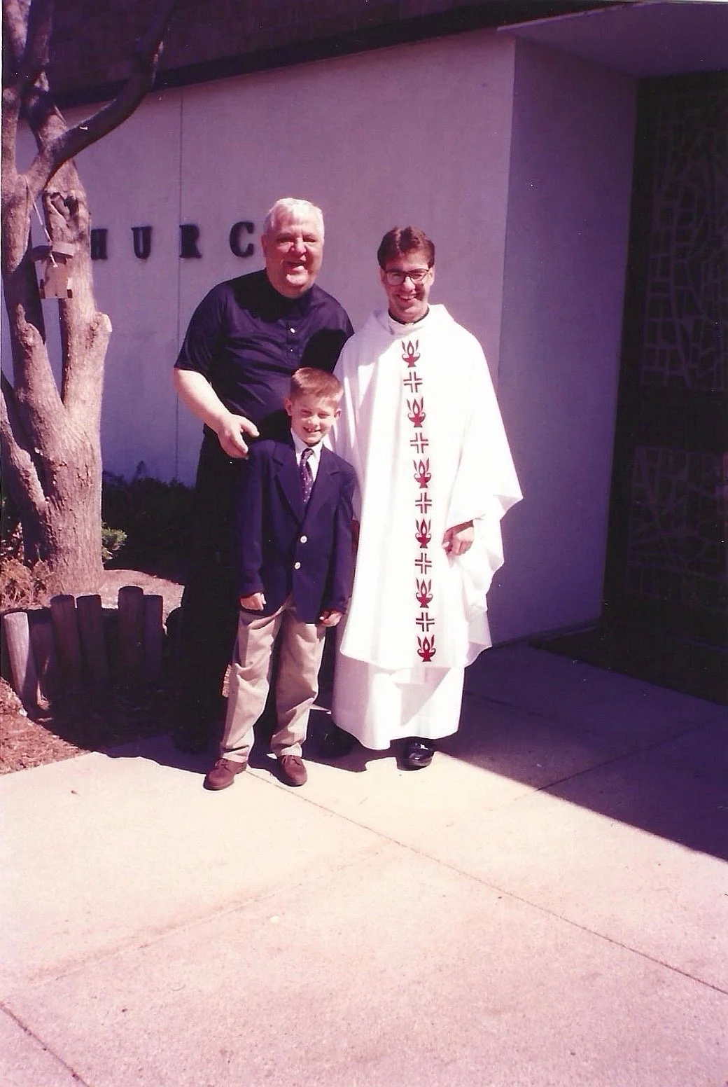 Nathan 1st Communion Msgr Holoman and Fr Meysenburg .jpg