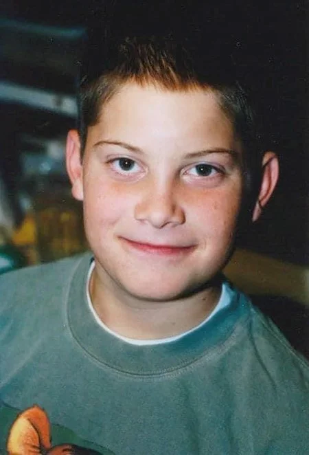 Nathan - green shirt.jpg