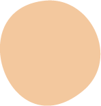A plain, round, peach-colored circle on a black background.