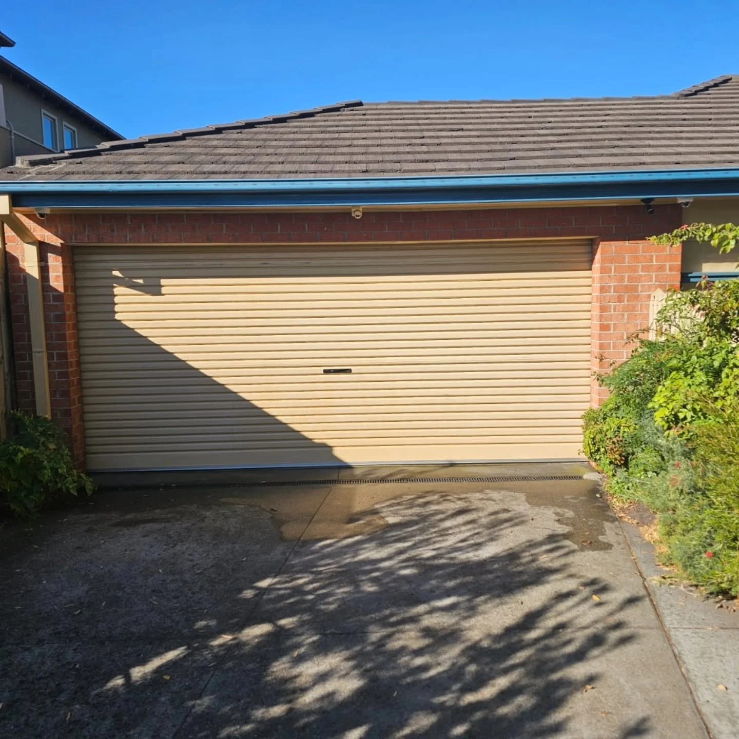 Exterior house pressure washing and surface preparation before painting