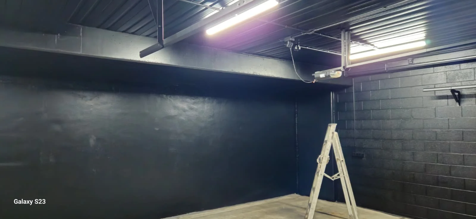 Completed garage interior painting and restoration project