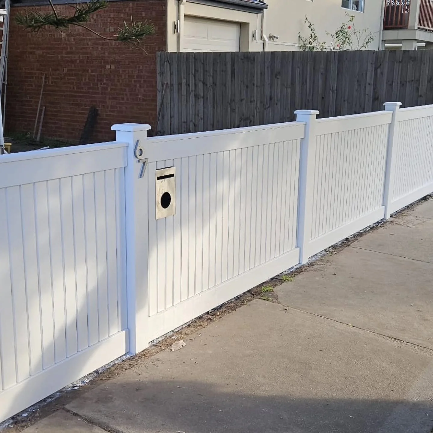 Timber fence repainting and restoration in Mordialloc
