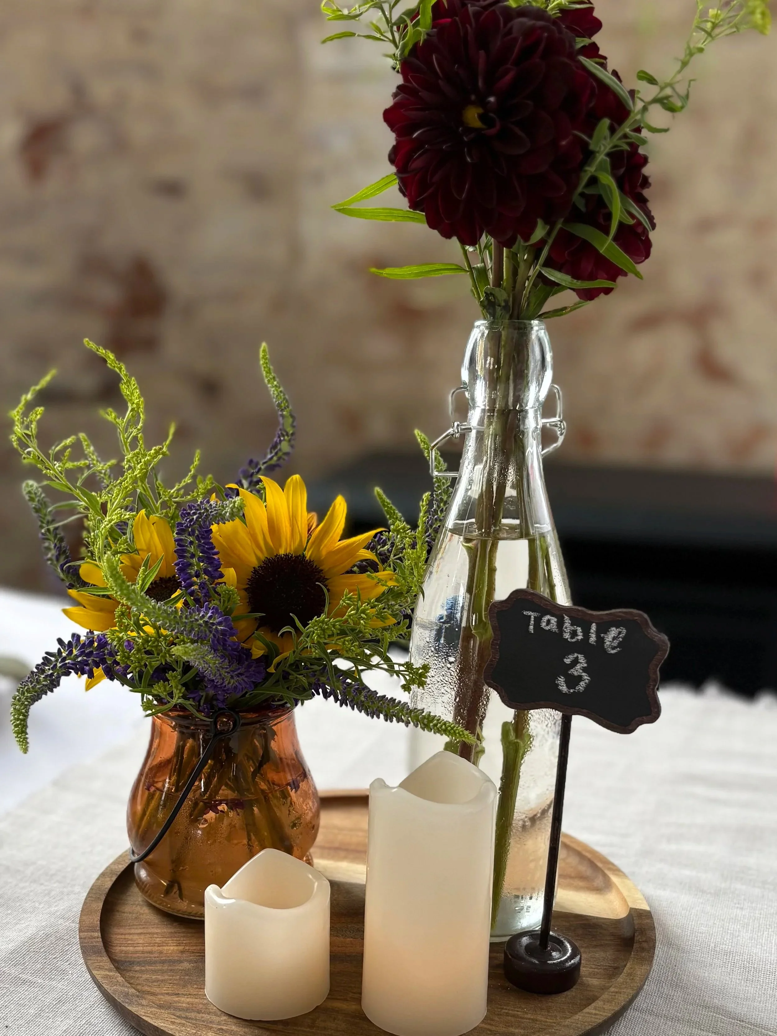 Elegant wedding reception centerpieces with candles and florals at Stark County Ohio Venue near Alliance