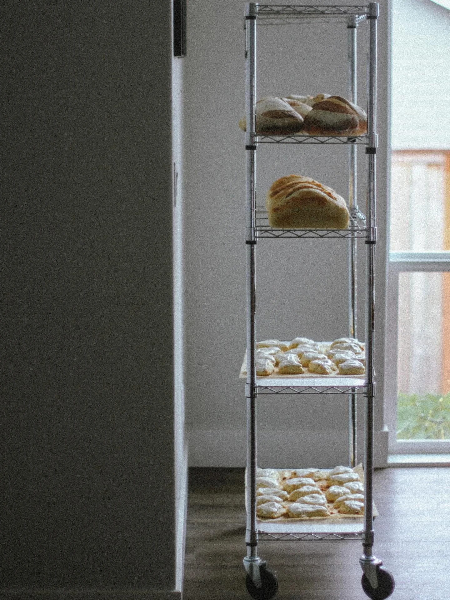 This metro with wheels has been a total game changer for cooling loaves + more. 10/10 recommend!