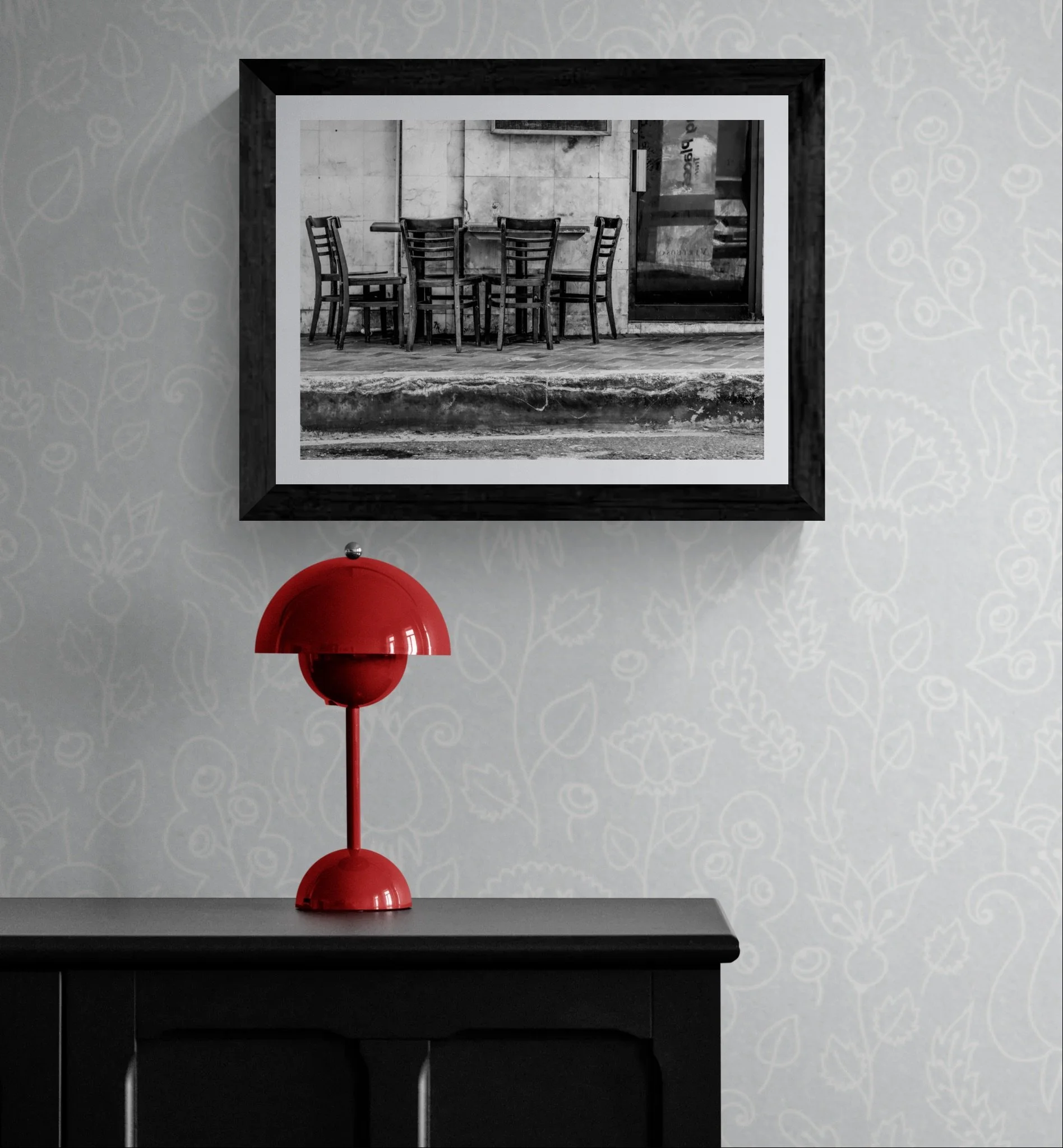 Close-up view of a lamp on a black cabinet.jpeg