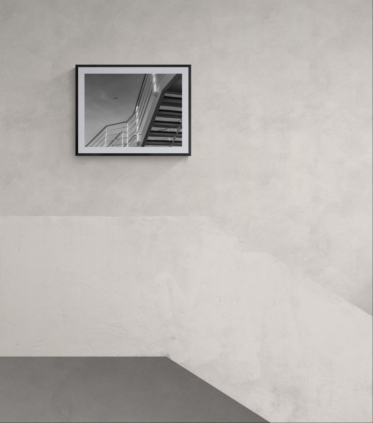 Young man walking down a concrete staircase.jpeg