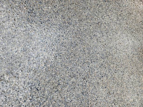 Close-up of a sandy beach or desert with fine, light-colored sand.