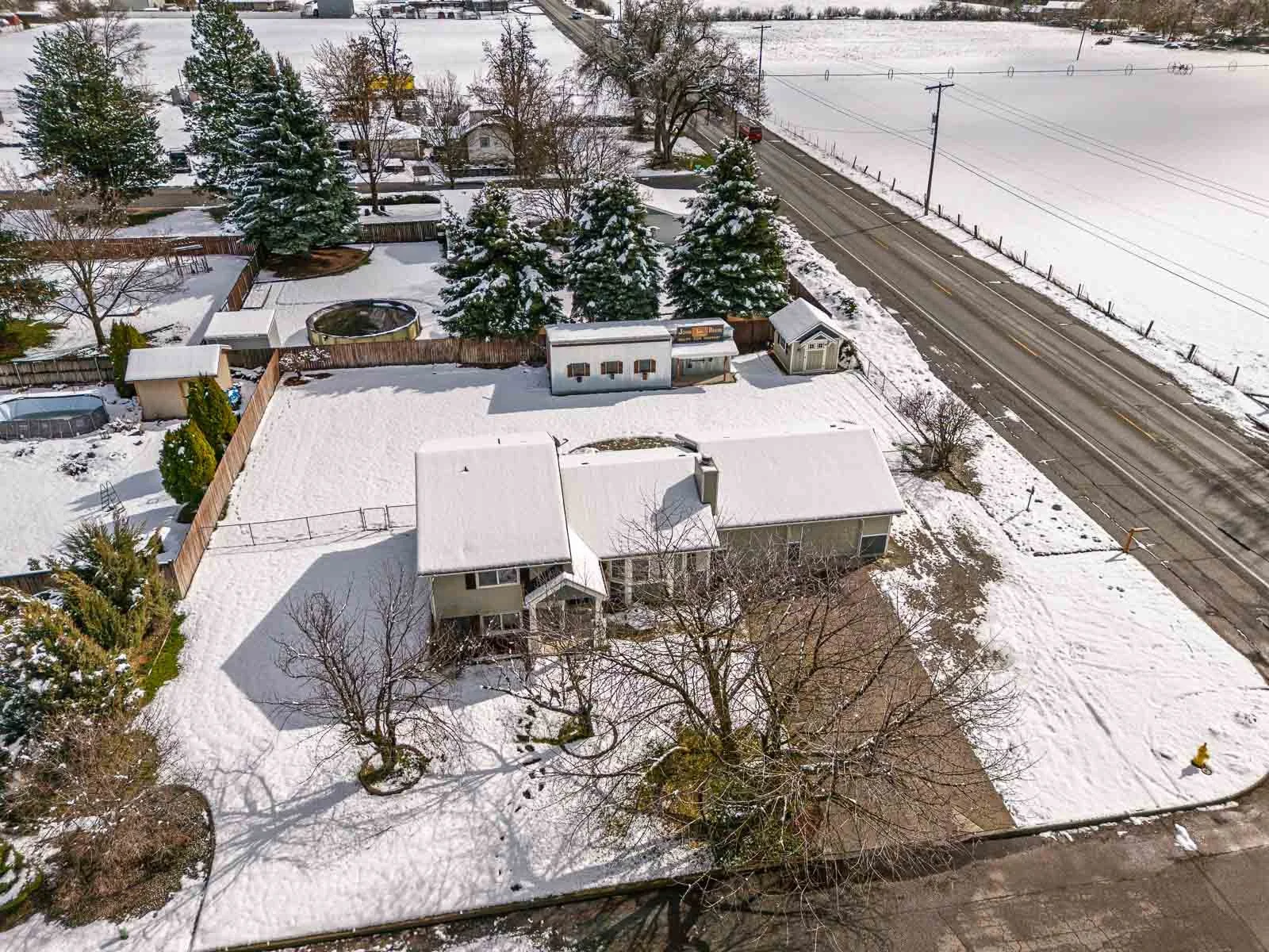 drone image of spokane house for sale snow on ground