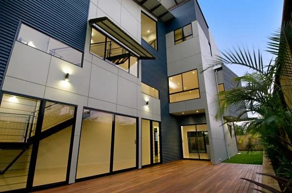 Oranssi technician working on a roof project