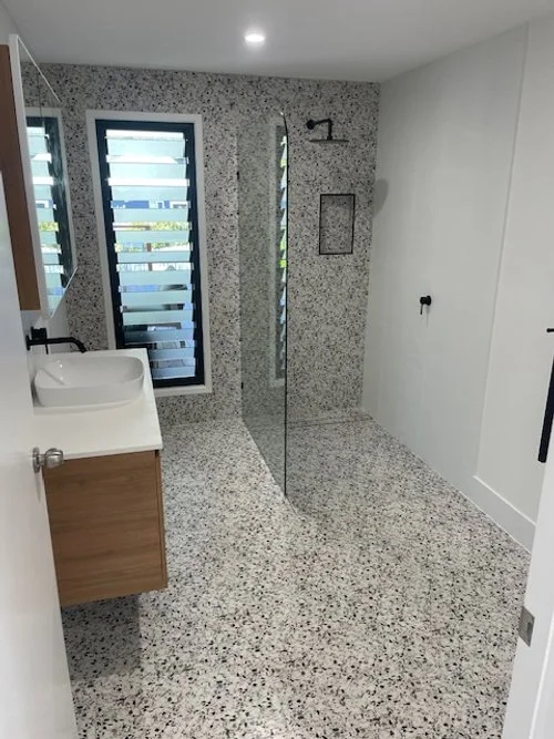 Bathroom including shower