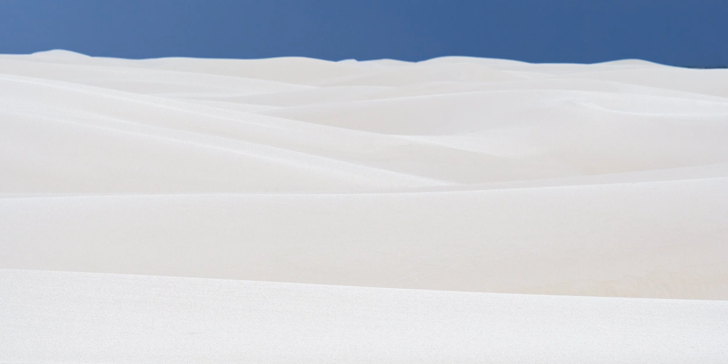 white-sands-layers-blue-mountains.jpg