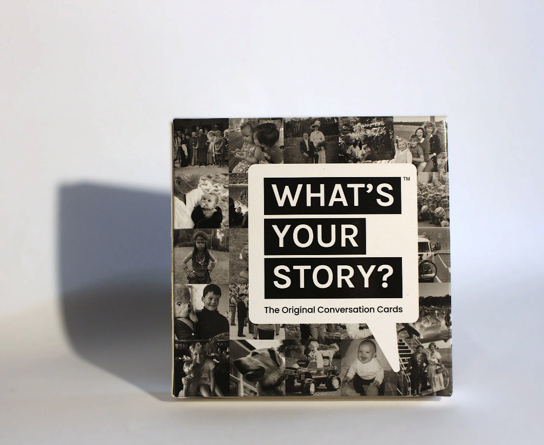 What’s Your Story? card game box on a white background, designed to spark meaningful conversations with family, friends, and coworkers.