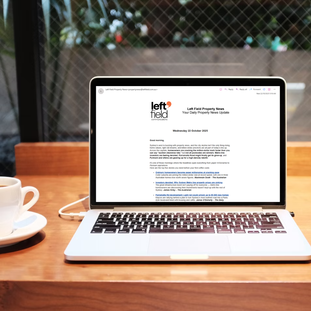 Open laptop displaying Left Field Property News, providing the latest insights and updates on property developments and market trends.