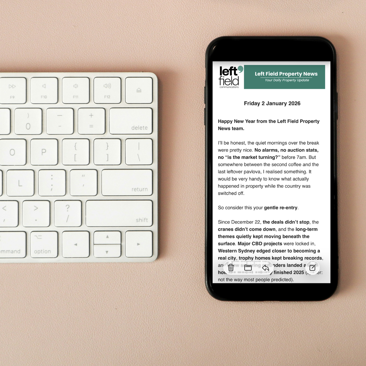 Smartphone showing Left Field Property News, enabling on-the-go access to property industry news and community updates.