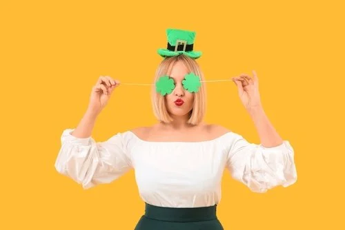 Close-up of a lit sparkler with bright sparks flying, dark blurred background. Image is used to promote CouplesTherapy.co social media pages with the handle @couplestherapy.co.