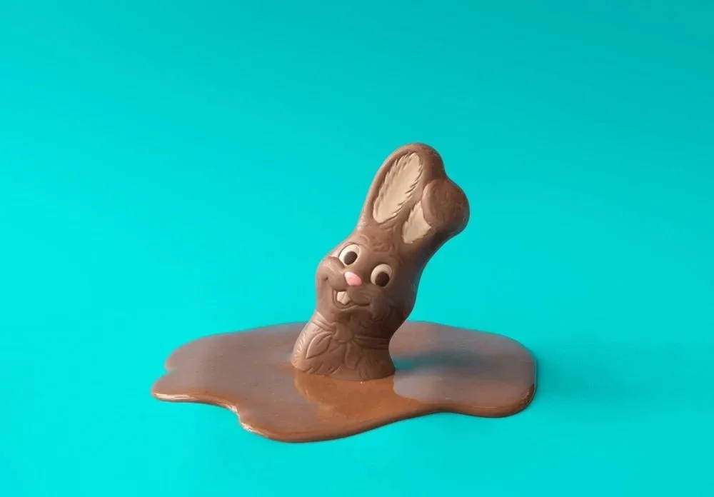 A green Christmas tree-shaped decoration with small disco ball ornaments hanging on it, topped with a leaf.  Image is for our Singles Sessions or Individual Therapy at CouplesTherapy.co in December.