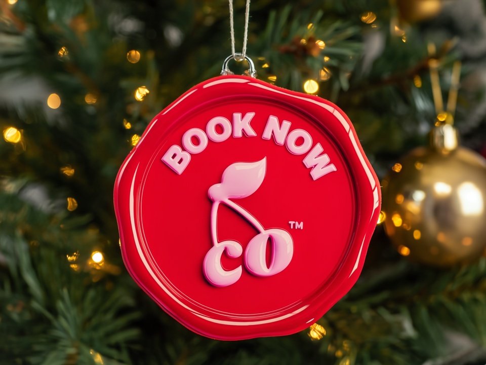 A green Christmas tree-shaped decoration with small disco ball ornaments hanging on it, topped with a leaf.  Image is for our Singles Sessions or Individual Therapy at CouplesTherapy.co in December.