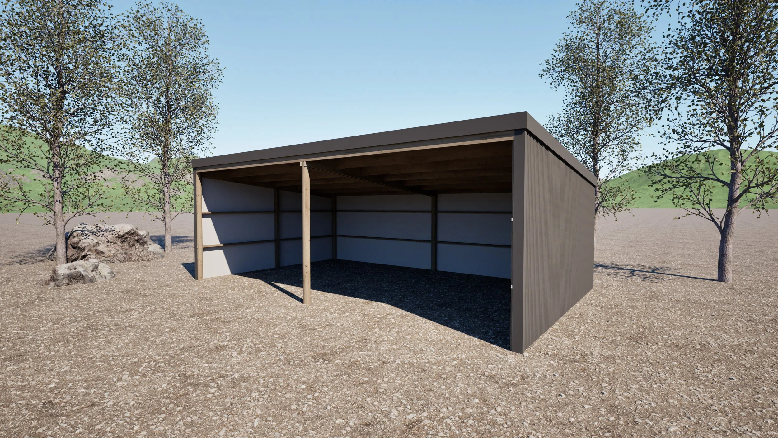 An outdoor shed with a metal exterior and wooden support beams, situated on a gravel ground surrounded by trees and distant green hills under a clear blue sky.