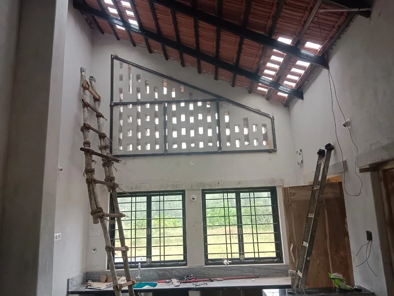 Interior view (plastered) showing jaali, roof and skylights [photo by contractor]