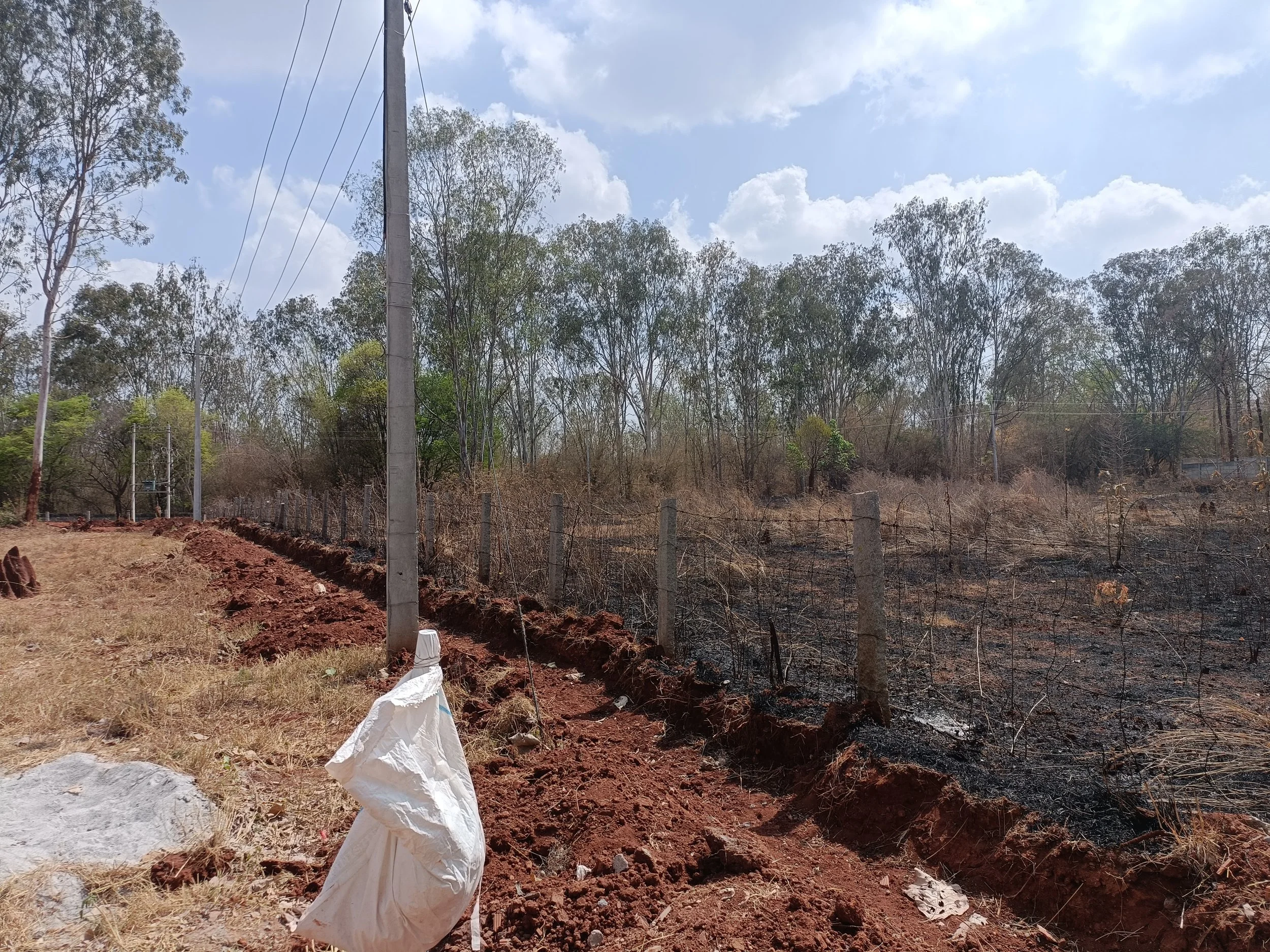 Peripheral trench stopping fire from entering the land