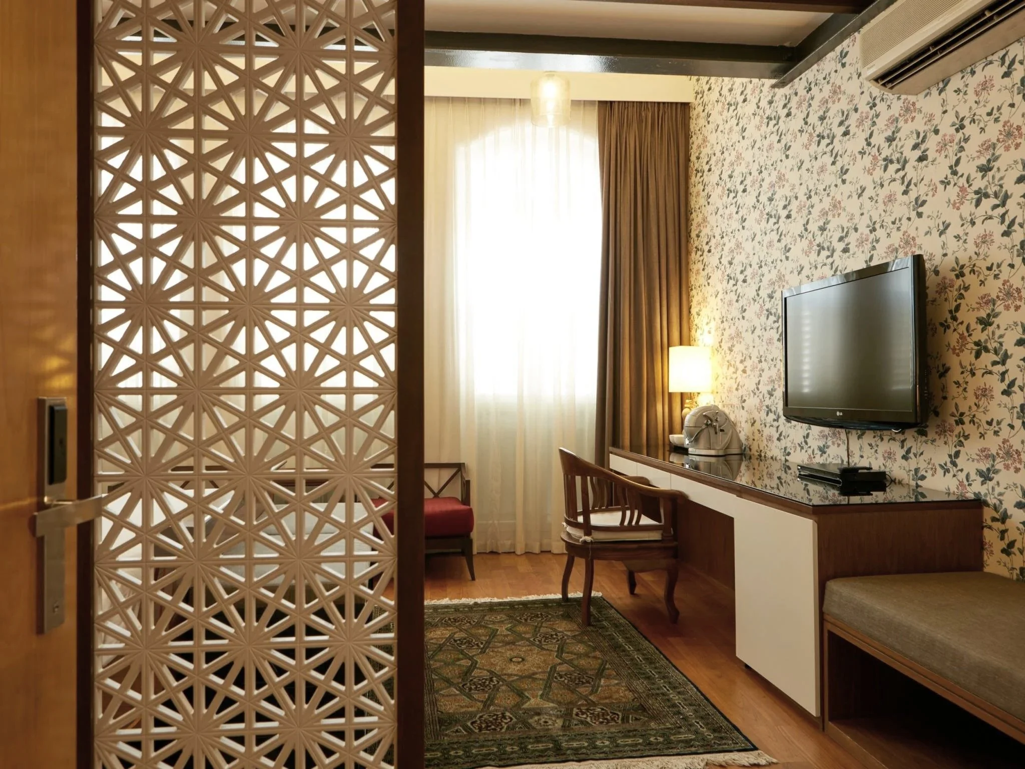Puteri Room with full-length work desk