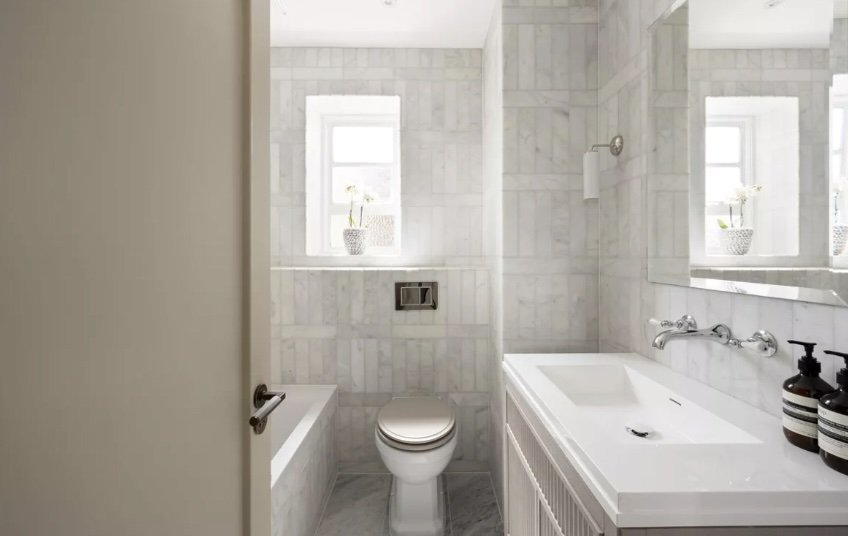 stacked marble tiles bathroom modern clean