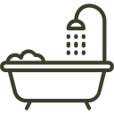 Bathtub with a showerhead above it