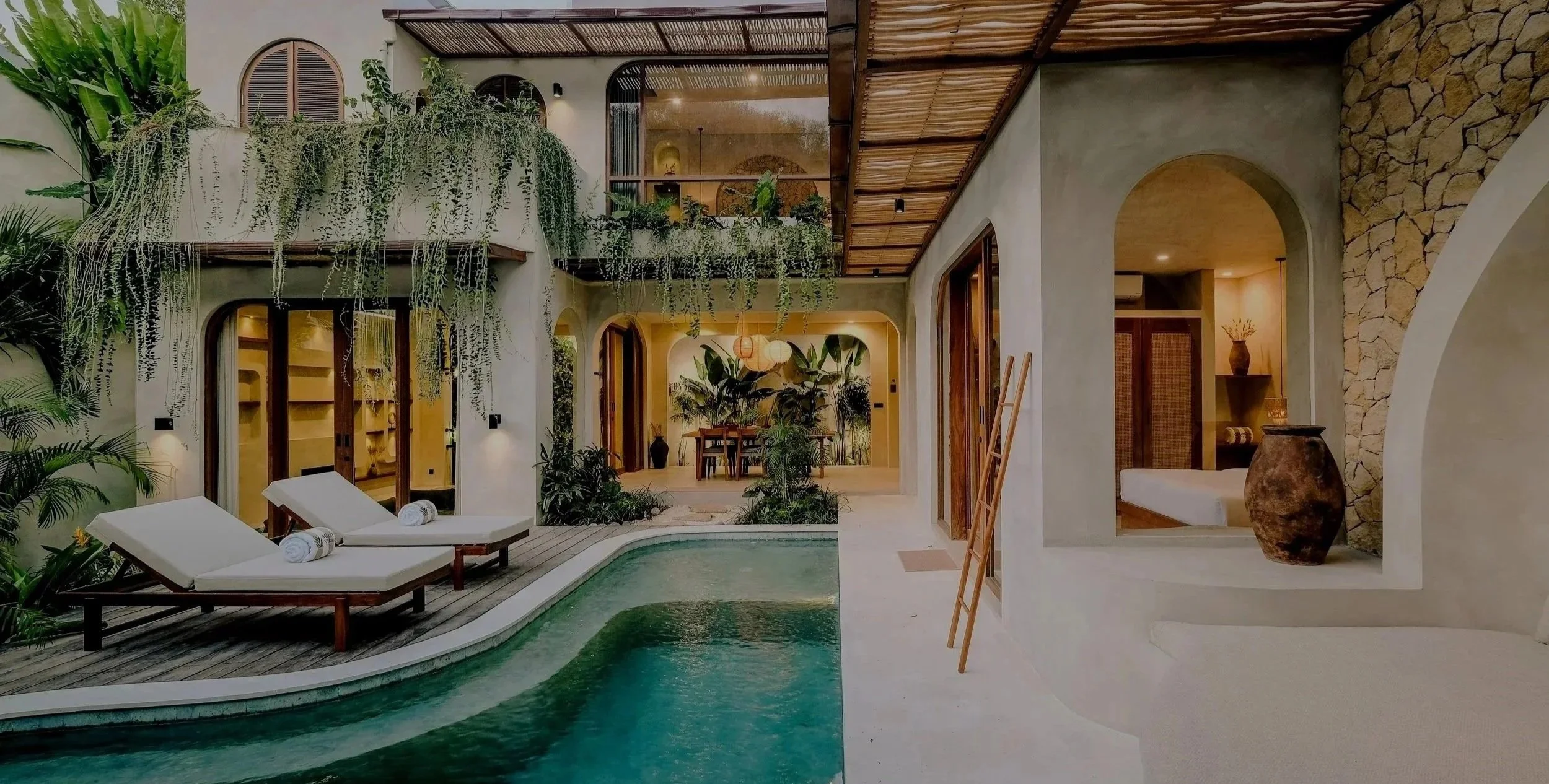 Image of a 2-bedroom villa with pool and sunbeds