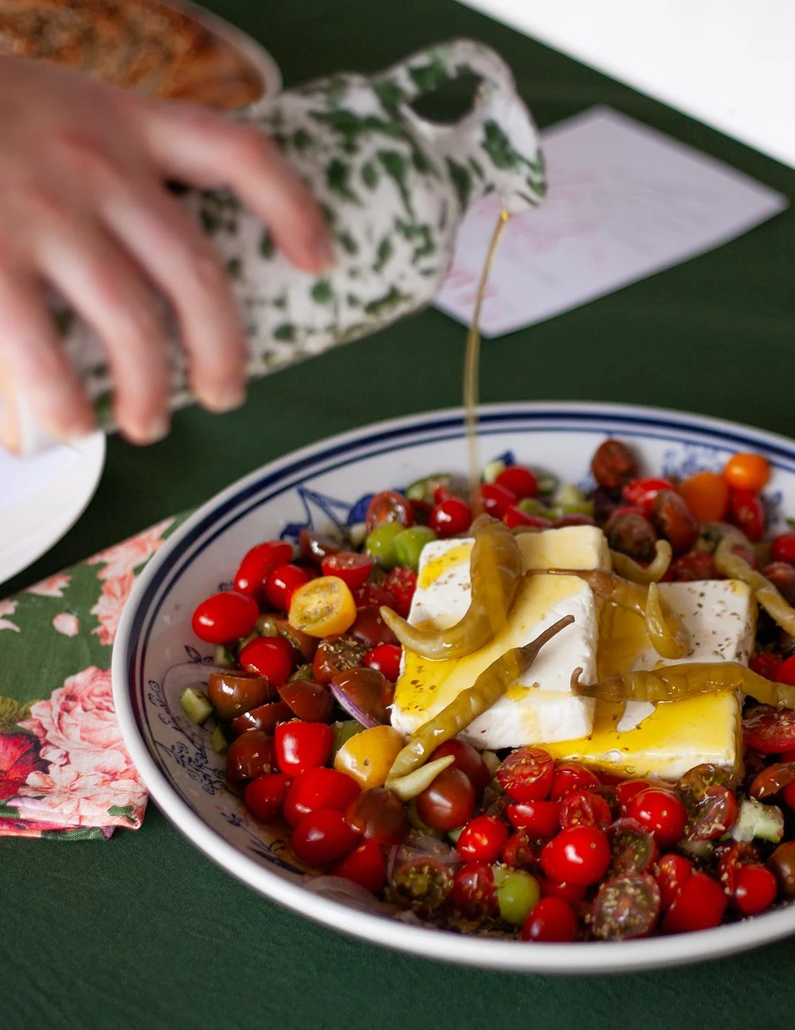 Dressing salad_A Greek Inspired Feast_The Dinner Party Guide.jpg