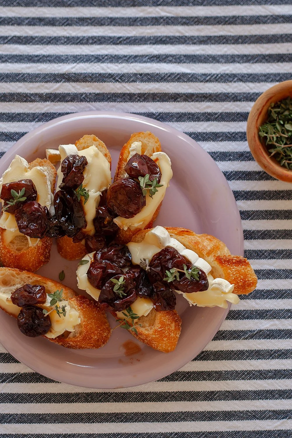 Close up Roasted Grape & Brie bites_The Crowd Pleaser_The Dinner Party Guide.jpg