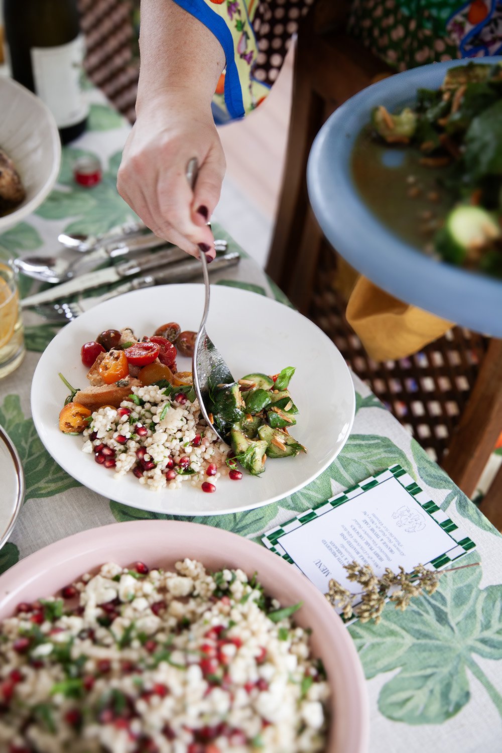 Serving a plate_Mediterranean Gathering_The Dinner Party Guide.jpg