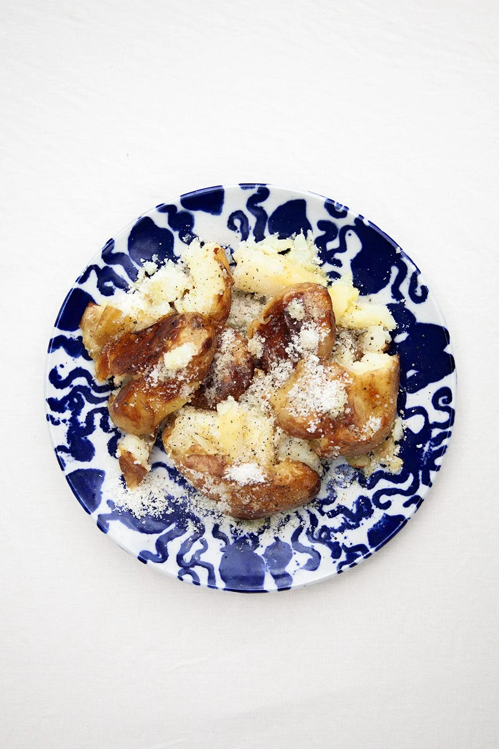 Smashed Cacio Pepper Potatoes