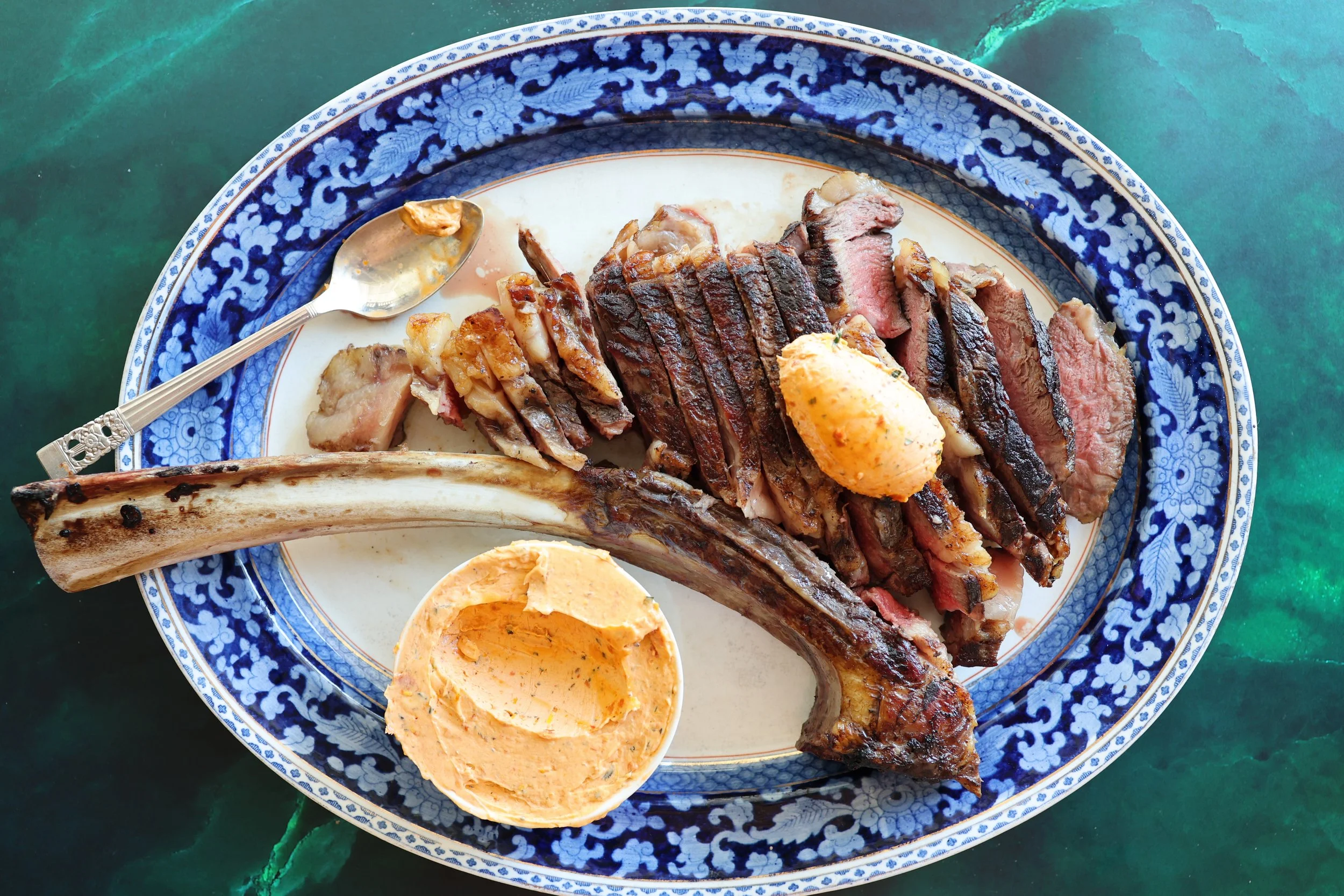 Large steak with flavoured butter