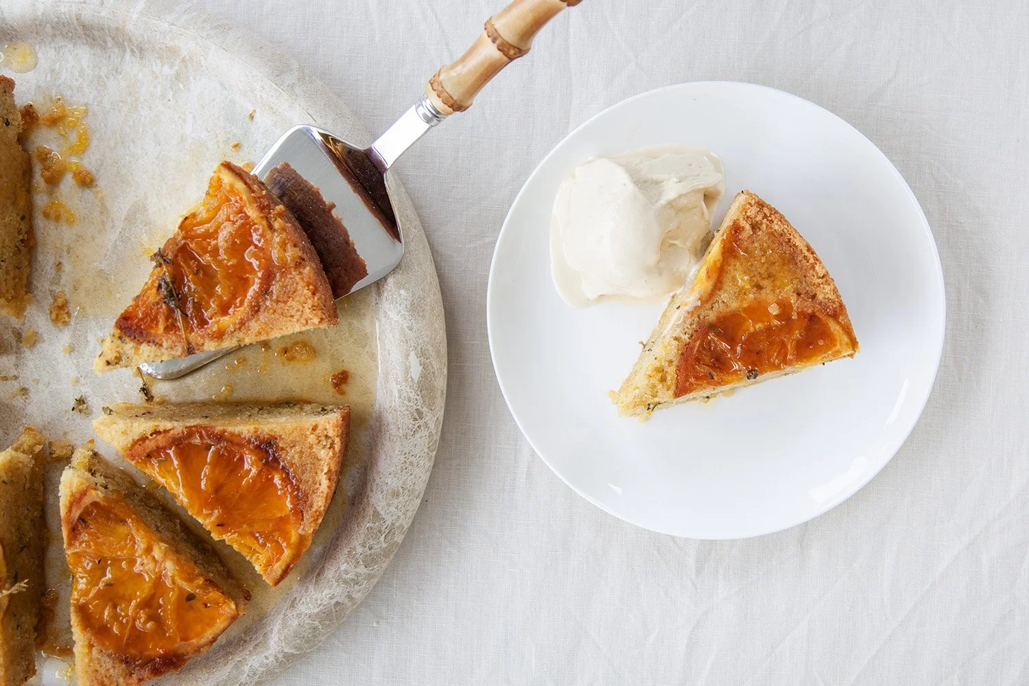 slices of cake being served with bamboo handled cake server
