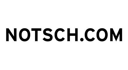 Schriftzug mit der URL 'NOTSCHIG.COM' auf schwarzem Hintergrund.