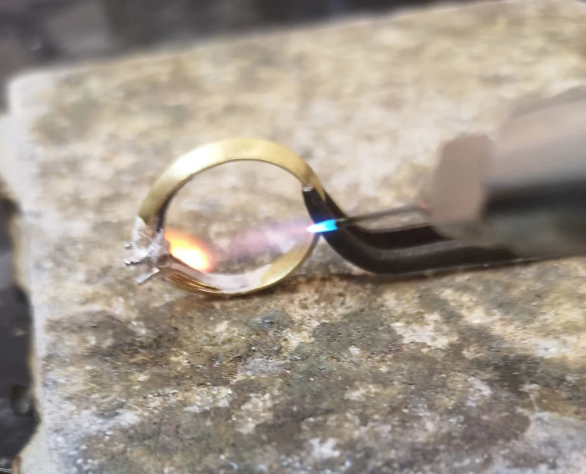 5, Soldering in platinum under  setting.jpg