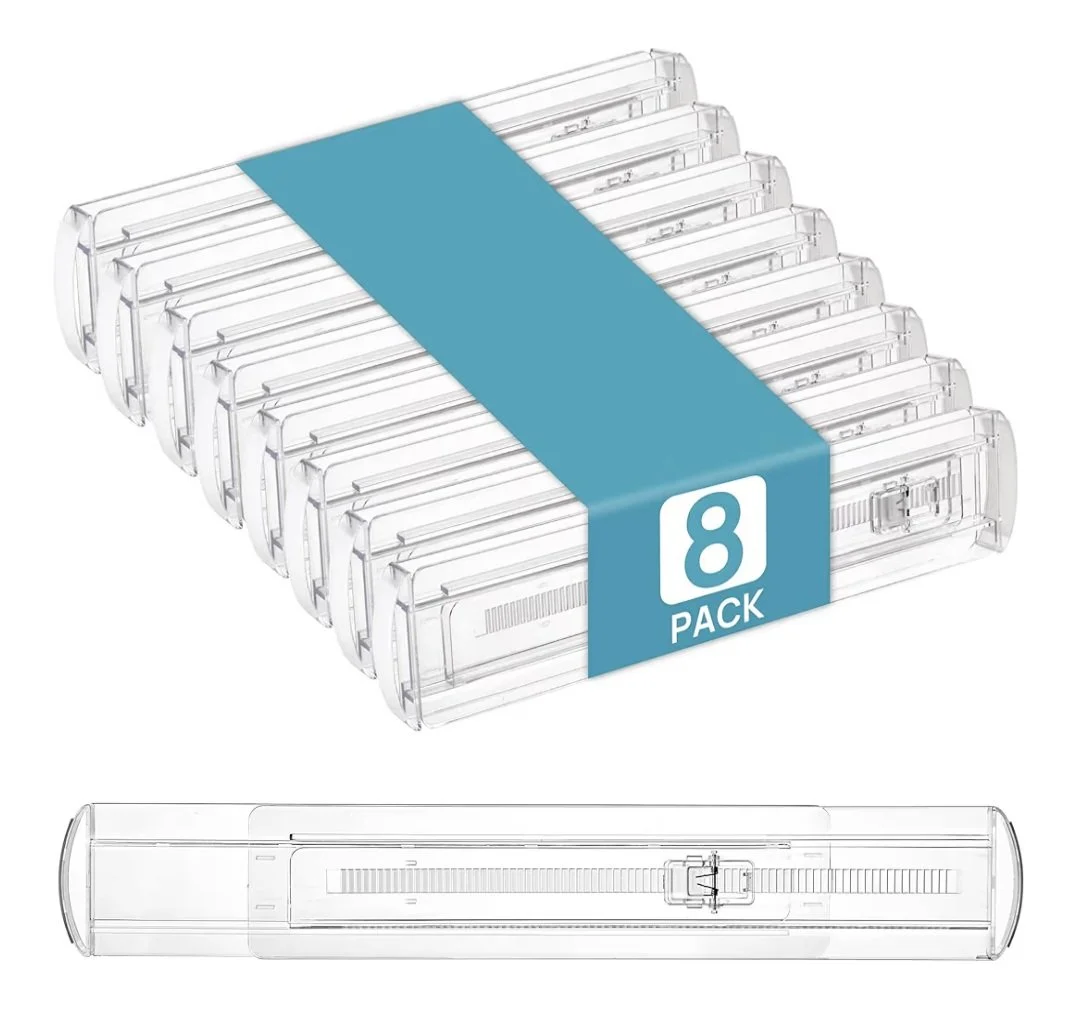 A pack of eight transparent drawer spacers meant for separating items into different categories, with a blue label indicating "8 pack."
