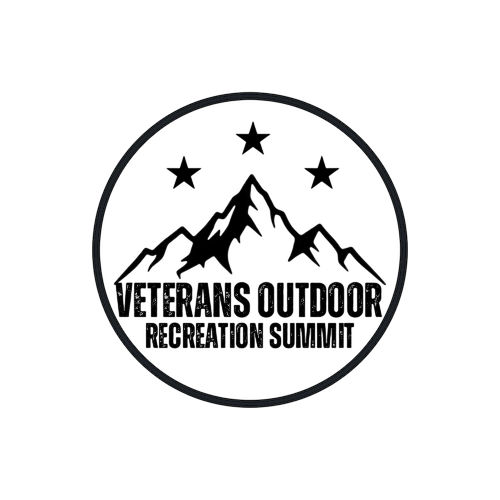 A circular logo with a mountain range, trees, and the text "Travel More, Worry Less".