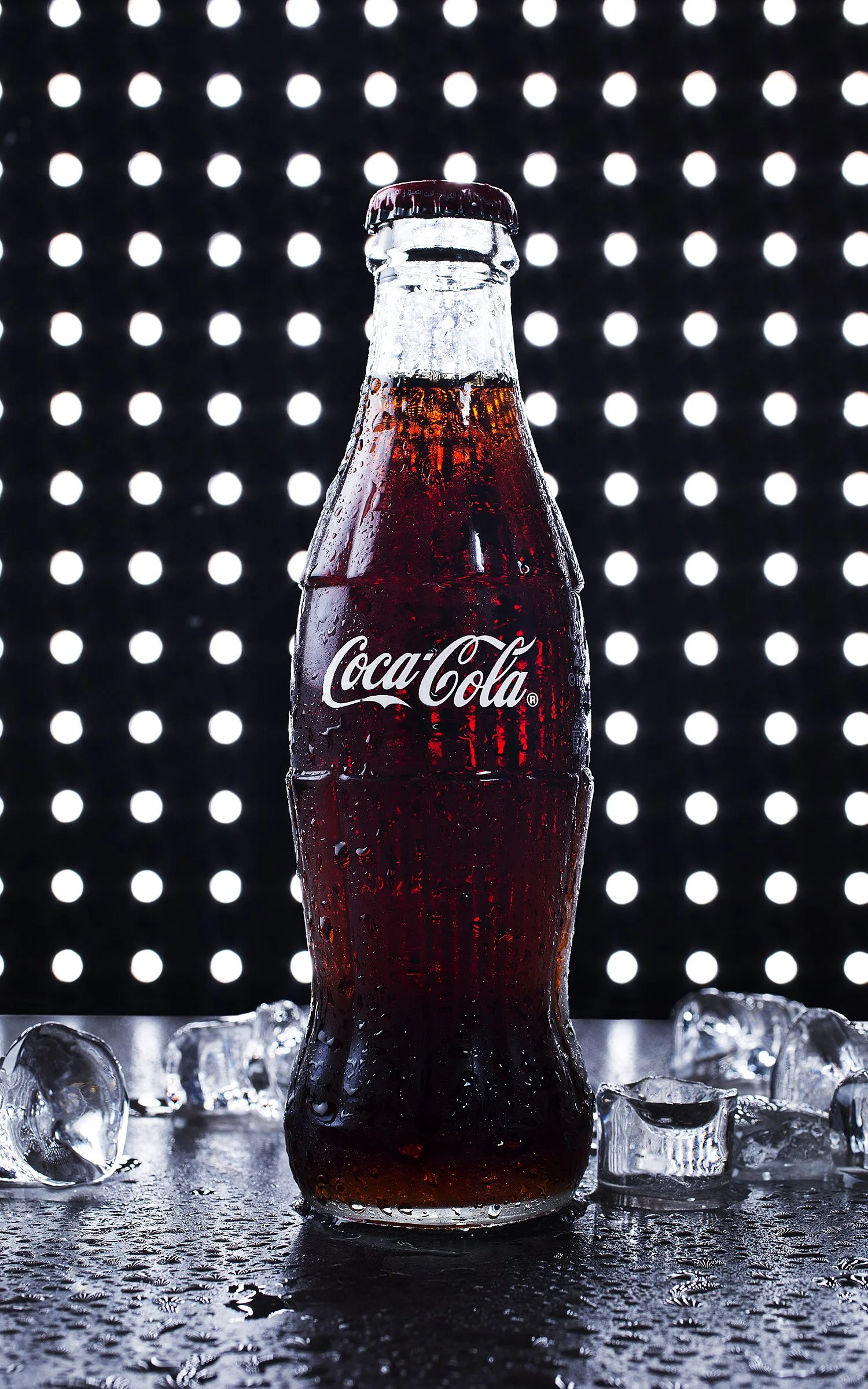 Coca-Cola bottle with condensation